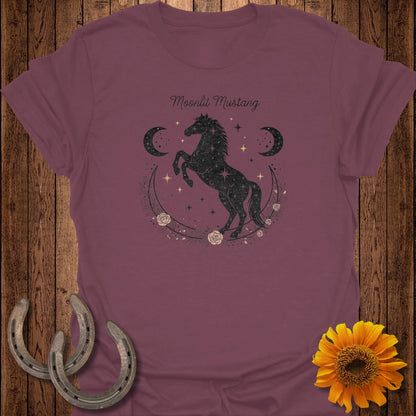 T-shirt with "Moonlit Mustang" text and a starry horse design within a crescent moon.