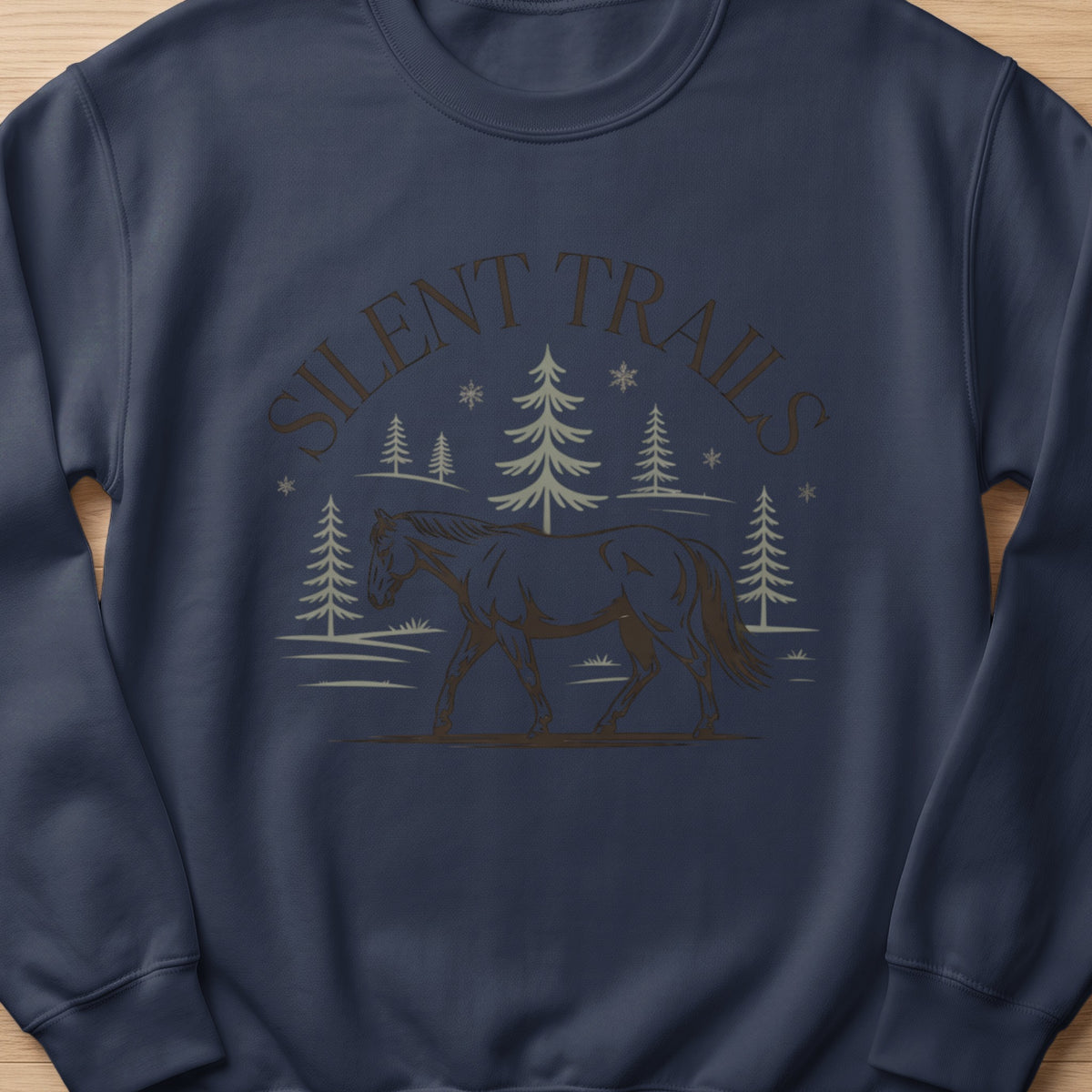 Dark navy sweatshirt with a graphic of a horse walking through trees and the text SILENT TRAILS.