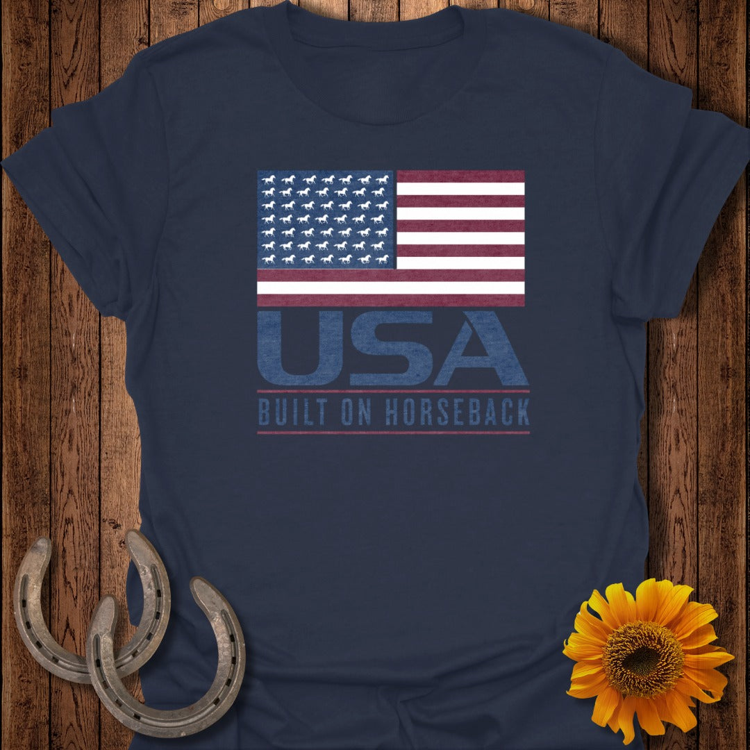 Navy t-shirt with American flag design and text "USA BUILT ON HORSEBACK".
