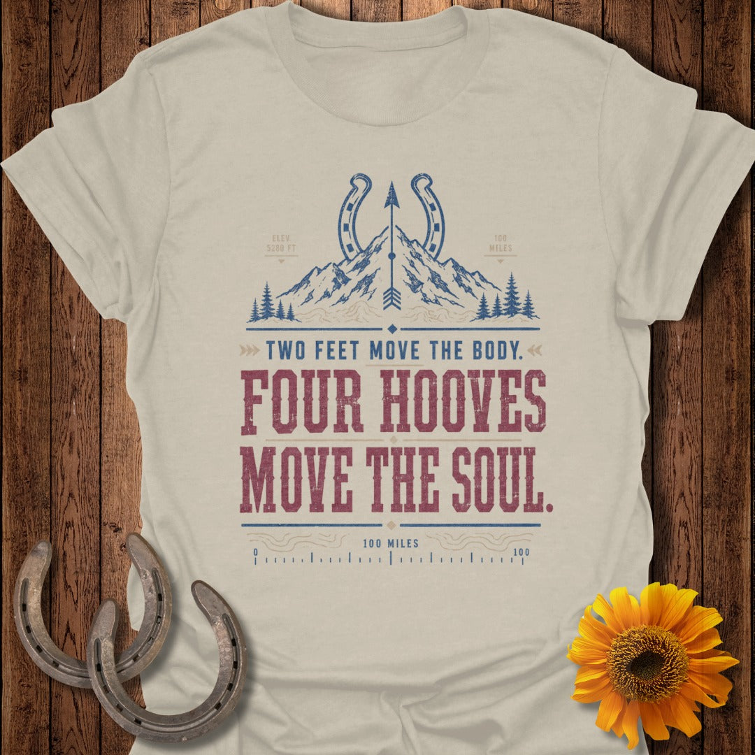 Cream t-shirt with "Four Hooves Move The Soul" text, mountains, and horseshoes.