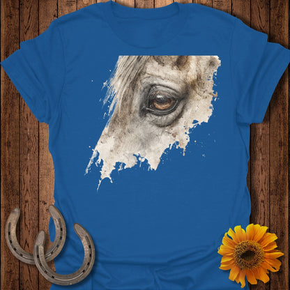 Blue t-shirt with watercolor horse eye graphic and horseshoes.