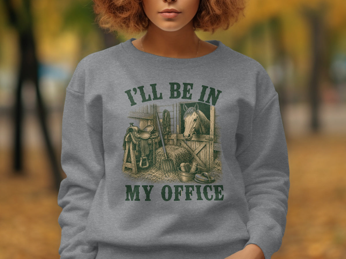 "I'LL BE IN MY OFFICE" graphic on a gray sweatshirt with a horse in a stable.
