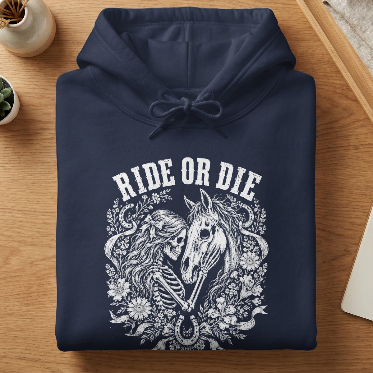 Navy hoodie with "Ride or Die" text and skeleton and horse graphic.