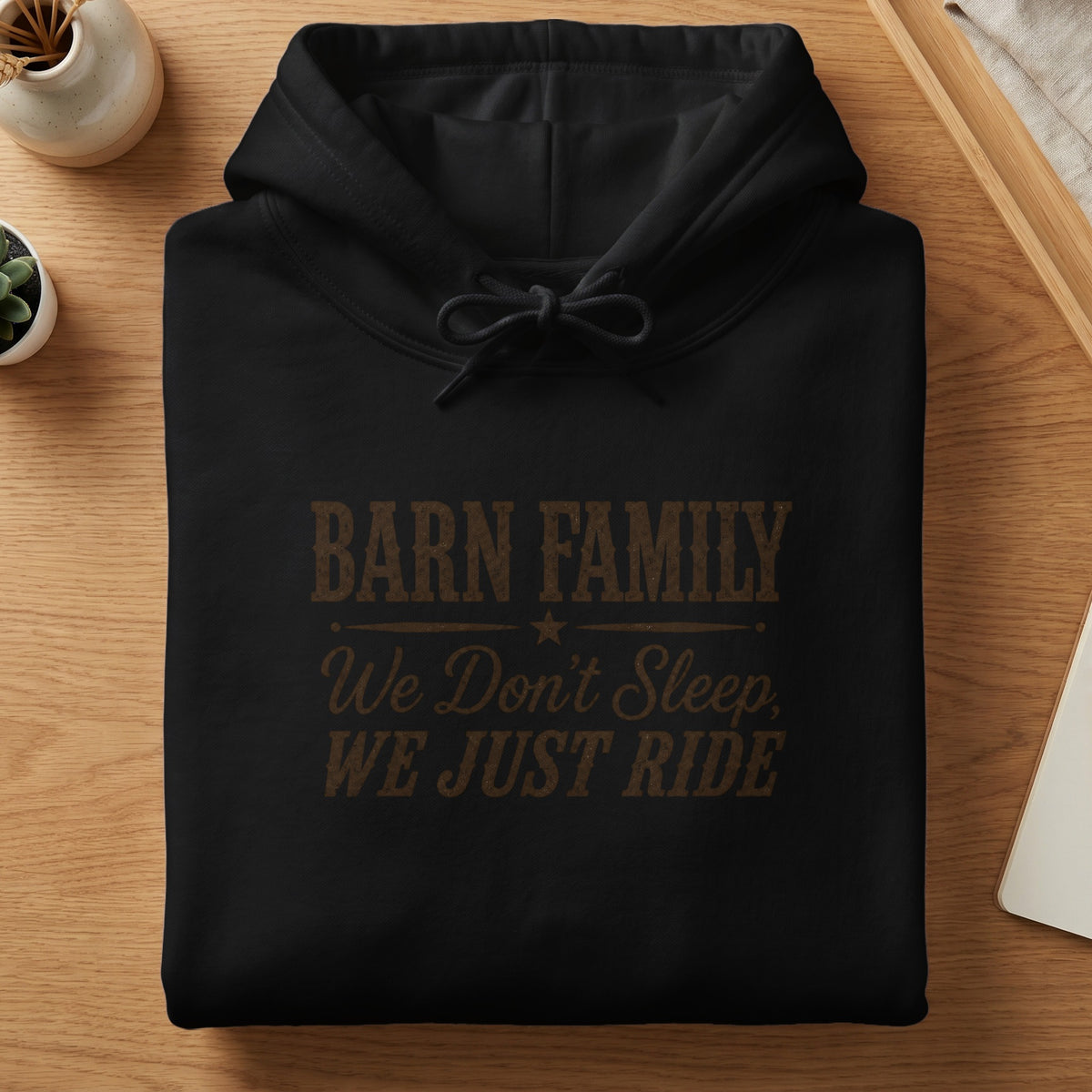 Black hoodie with "Barn Family We Don't Sleep, We Just Ride" text.