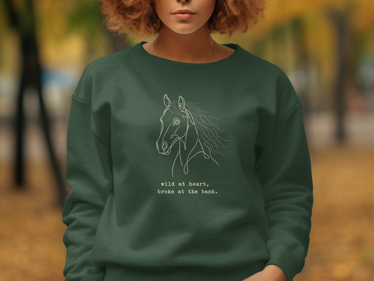 Dark green sweatshirt with white line art horse graphic and text.