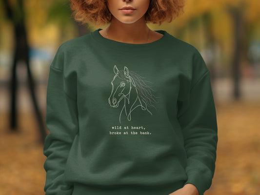 Dark green sweatshirt with white line art horse graphic and text.