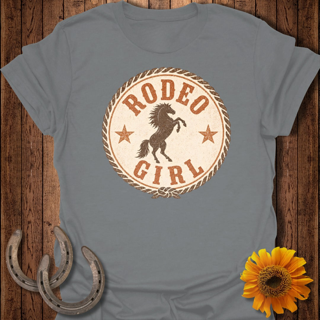 Grey t-shirt featuring a circular graphic with a horse and "Rodeo Girl" text.
