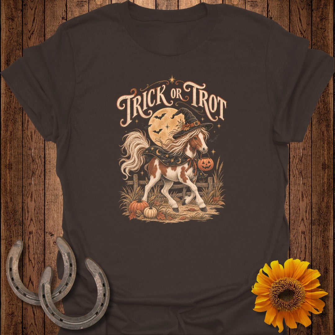 Horse wearing witch hat and holding pumpkin, with "Trick or Trot" text.