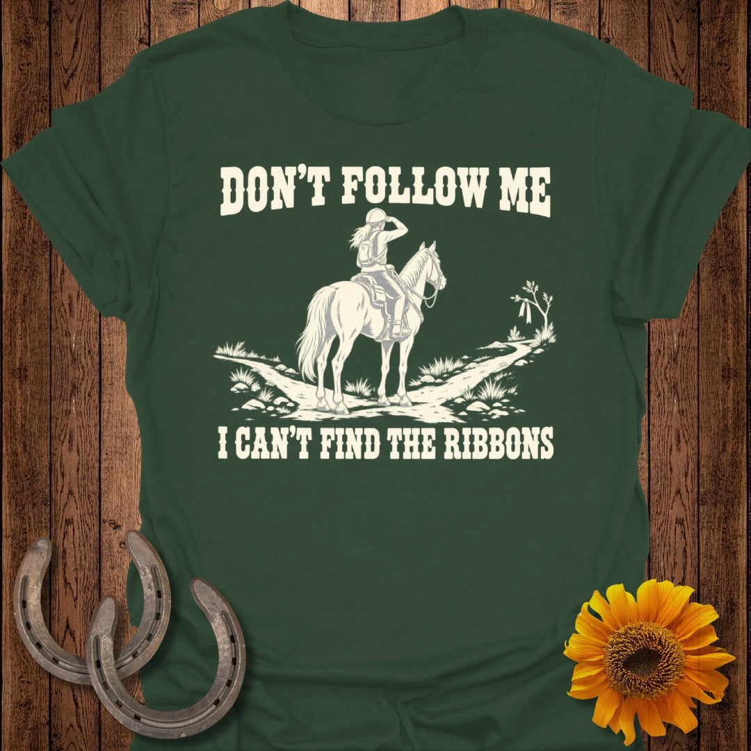 Green t-shirt with "Don't follow me I can't find the ribbons" and horse rider graphic.