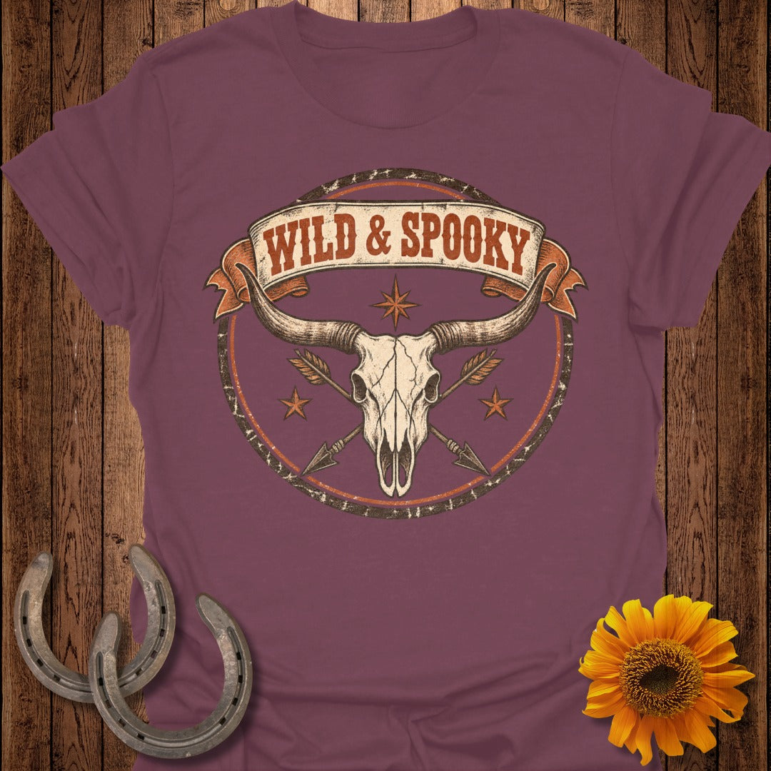 T-shirt with bull skull, arrows, and "WILD & SPOOKY" text within a circle.