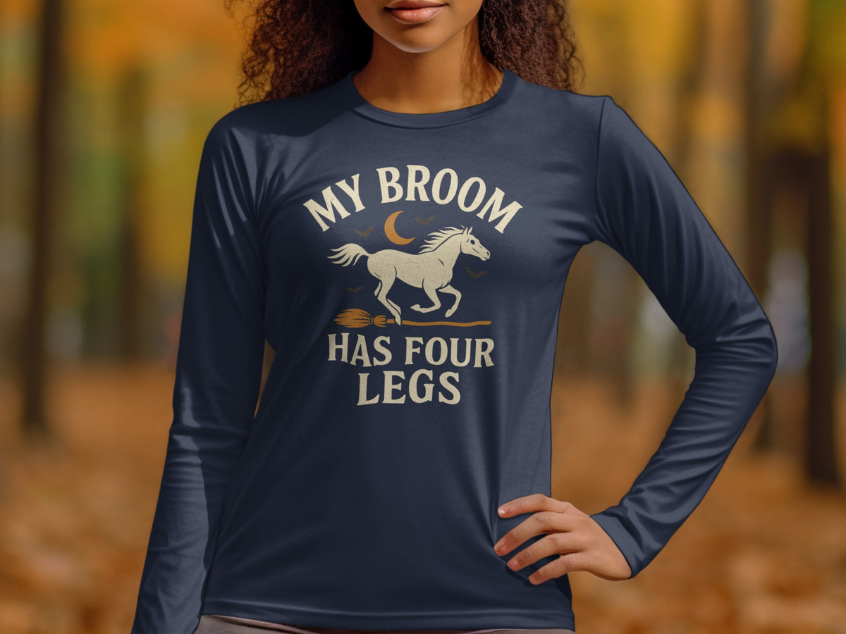 Dark blue long-sleeve shirt with text "MY BROOM HAS FOUR LEGS" and horse graphic.