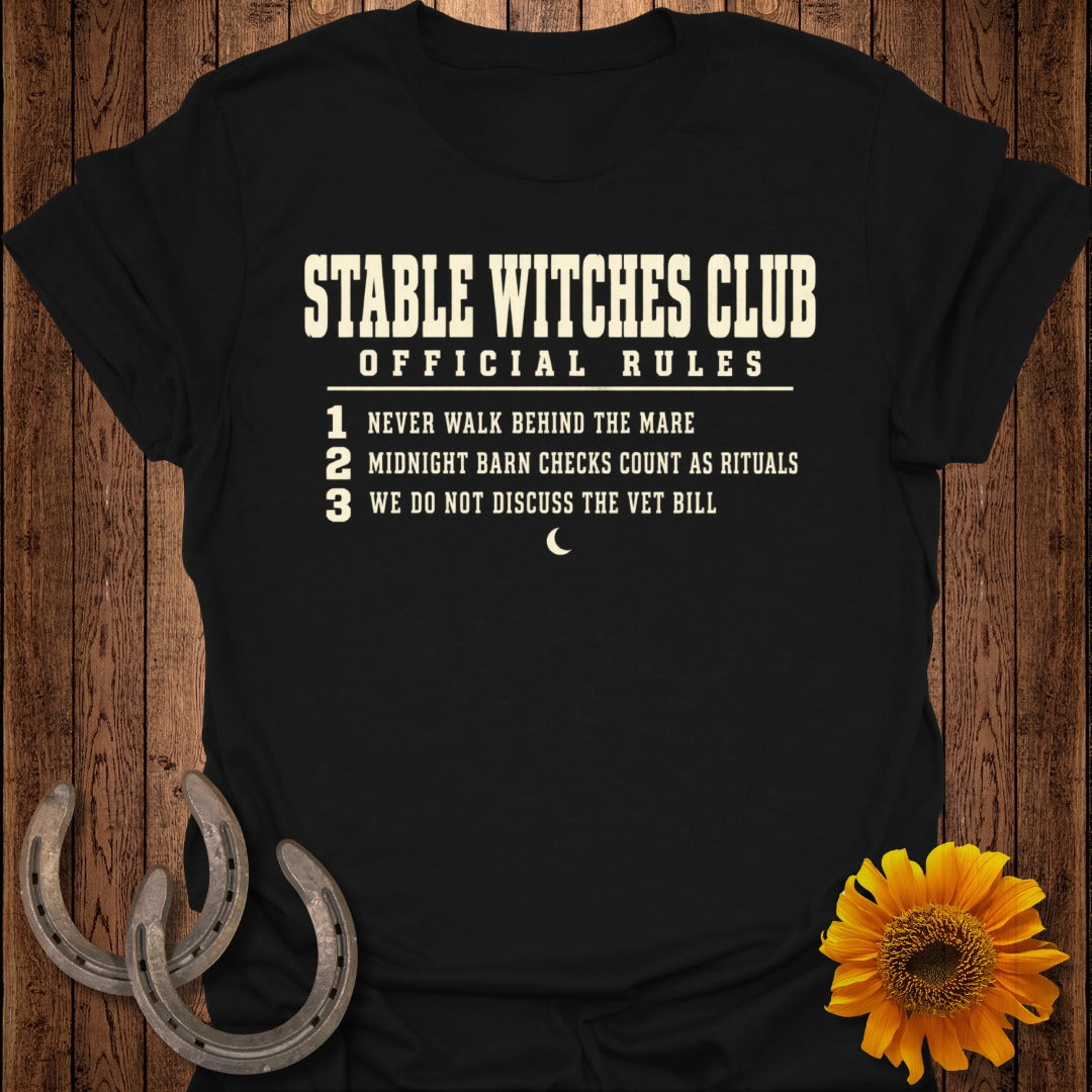 Black t-shirt with "Stable Witches Club Official Rules" and three humorous rules.