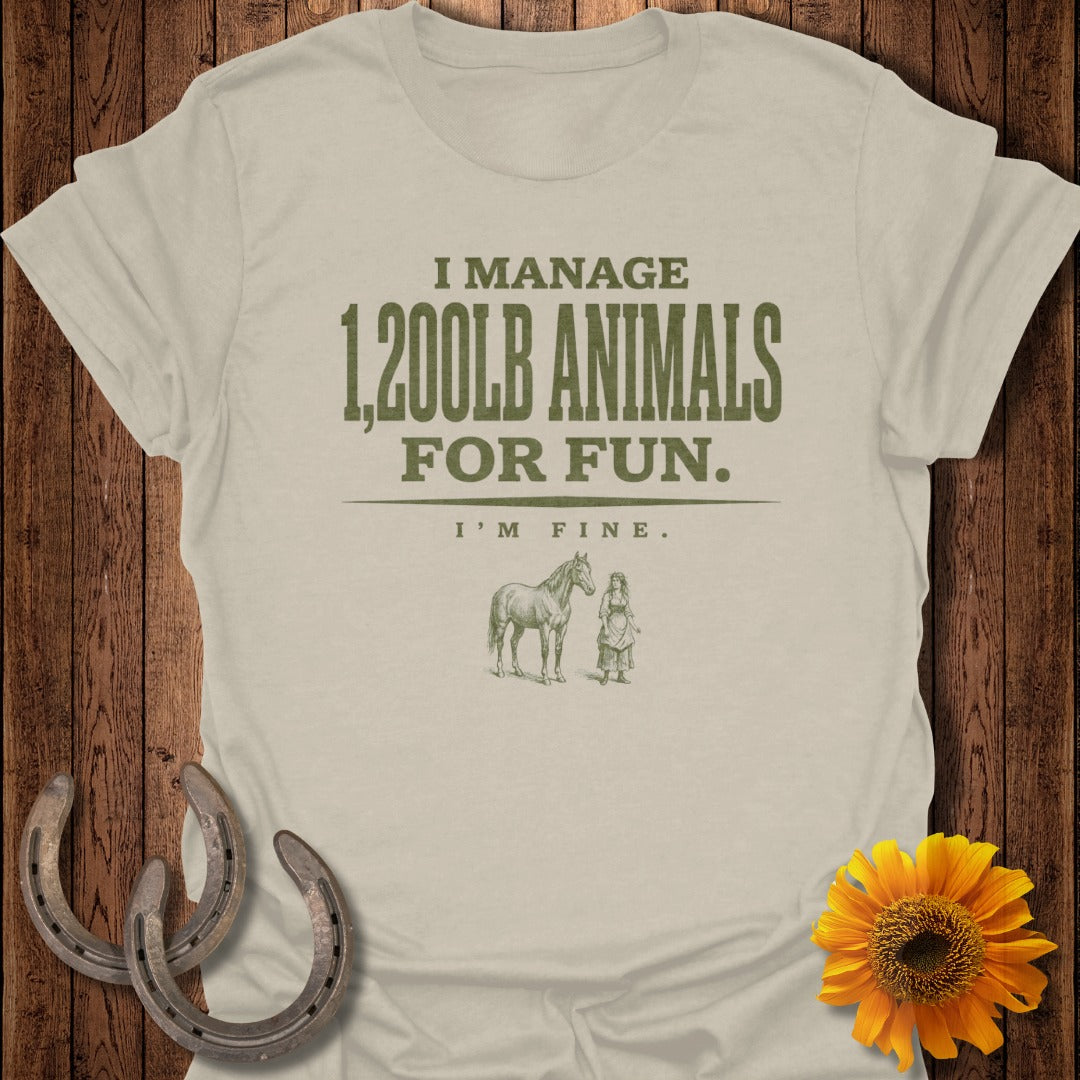 T-shirt with text "I manage 1,200lb animals for fun. I'm fine." and horse illustration.