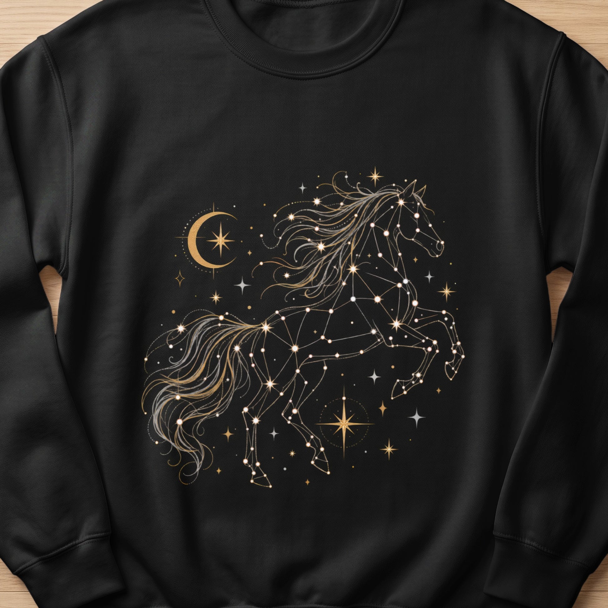 Black sweatshirt with a celestial horse constellation design and crescent moon.