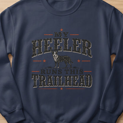 Navy sweatshirt with a distressed graphic of a blue heeler dog and text "MY HEELER RUNS THIS TRAILHEAD."