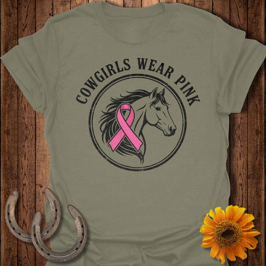 Olive t-shirt with "Cowgirls Wear Pink" text and a horse with a pink ribbon.