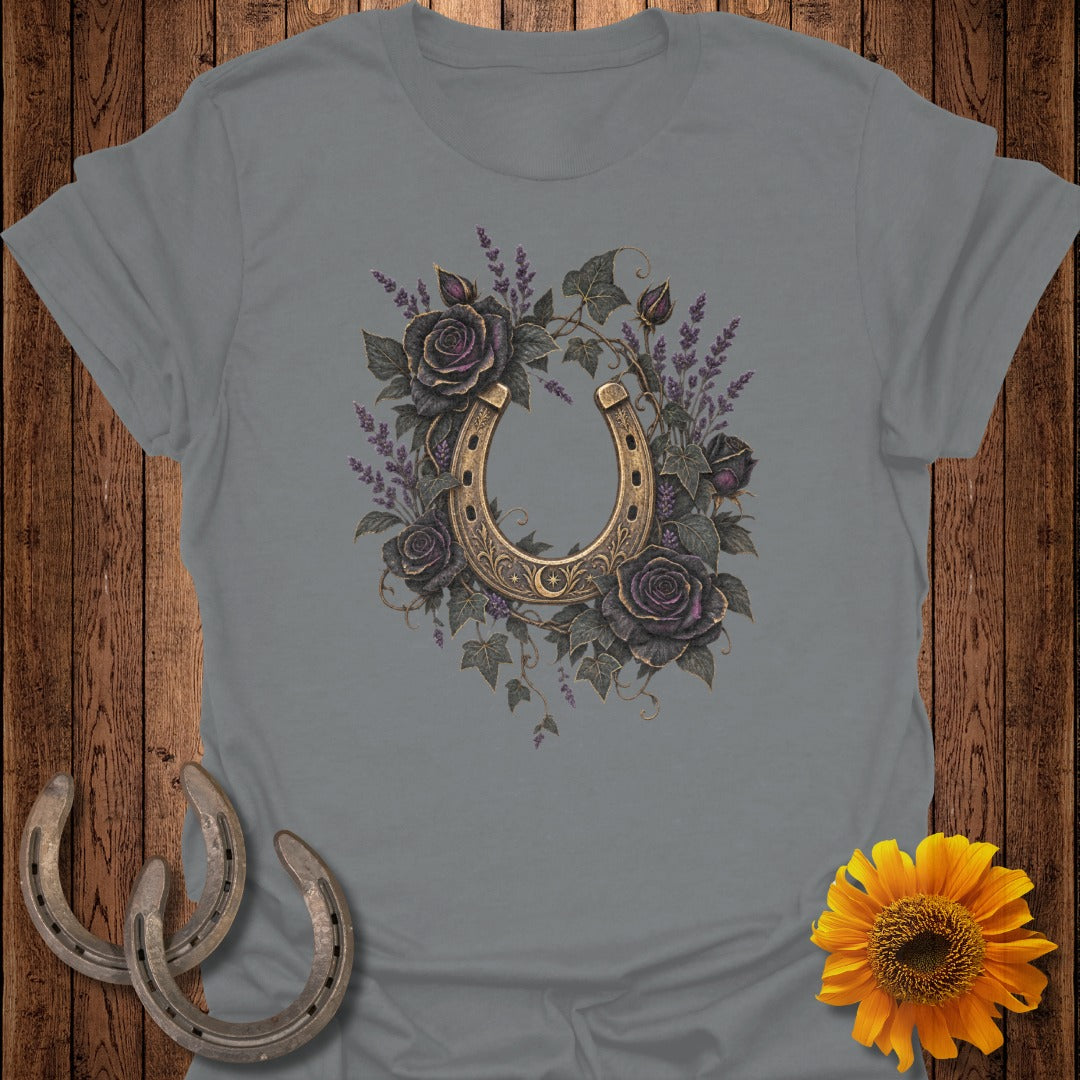 Grey t-shirt with a golden horseshoe surrounded by dark roses and lavender.