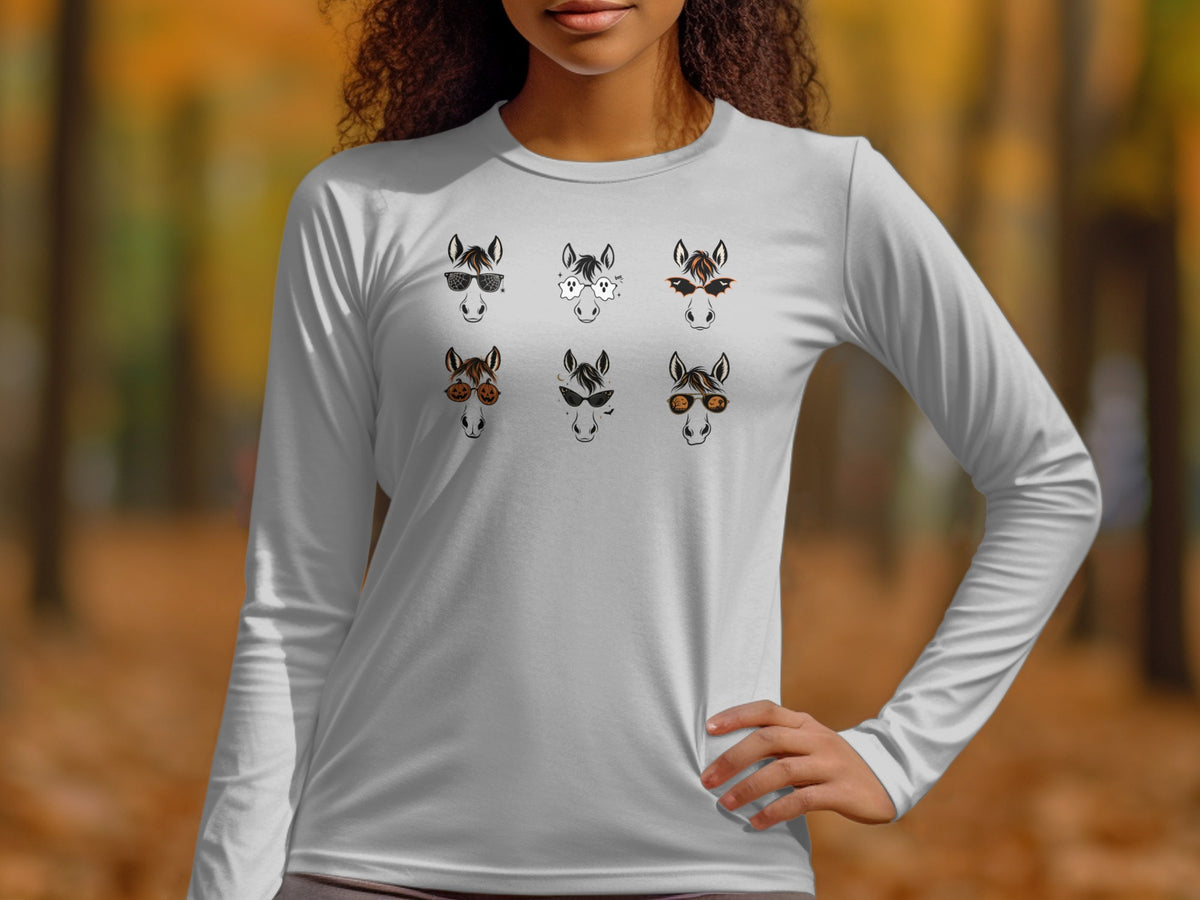 Six Halloween-themed horse heads with various glasses and accessories printed on a white long-sleeve shirt.