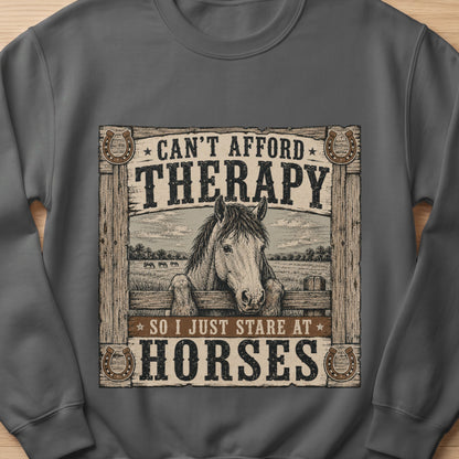 Grey sweatshirt with vintage design of a horse and text "Can't afford therapy so I just stare at horses".