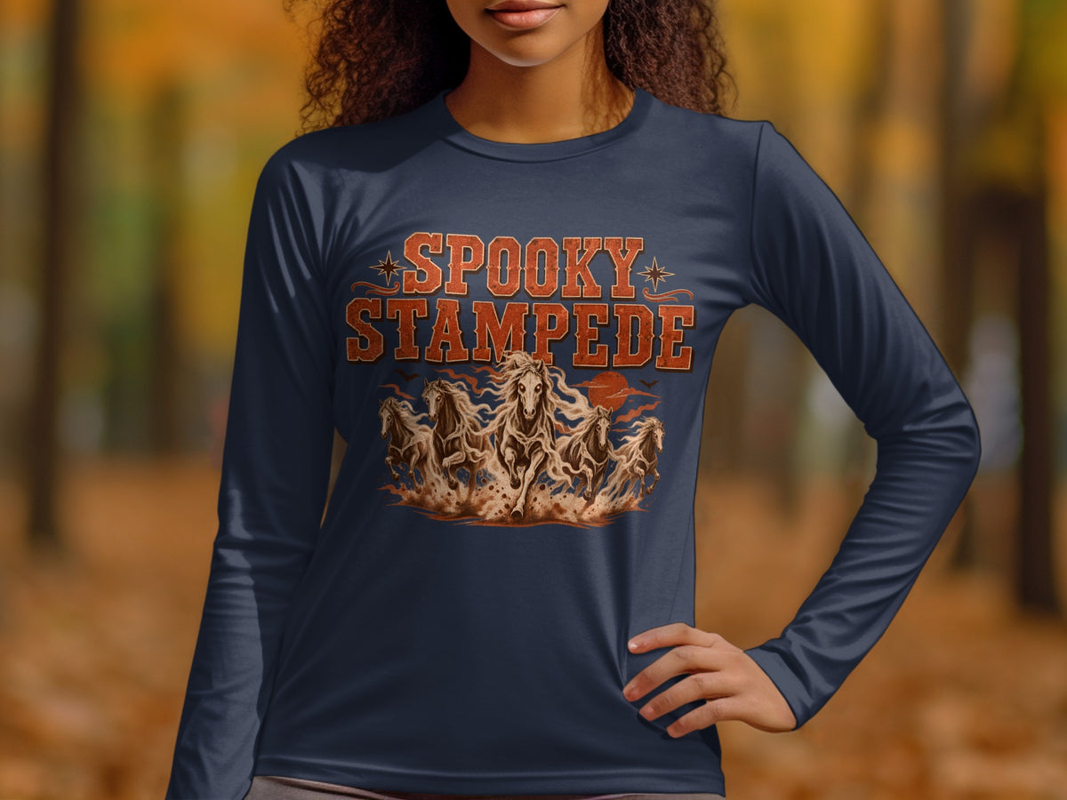 Spooky Stampede text on navy long-sleeve shirt with running horses graphic.