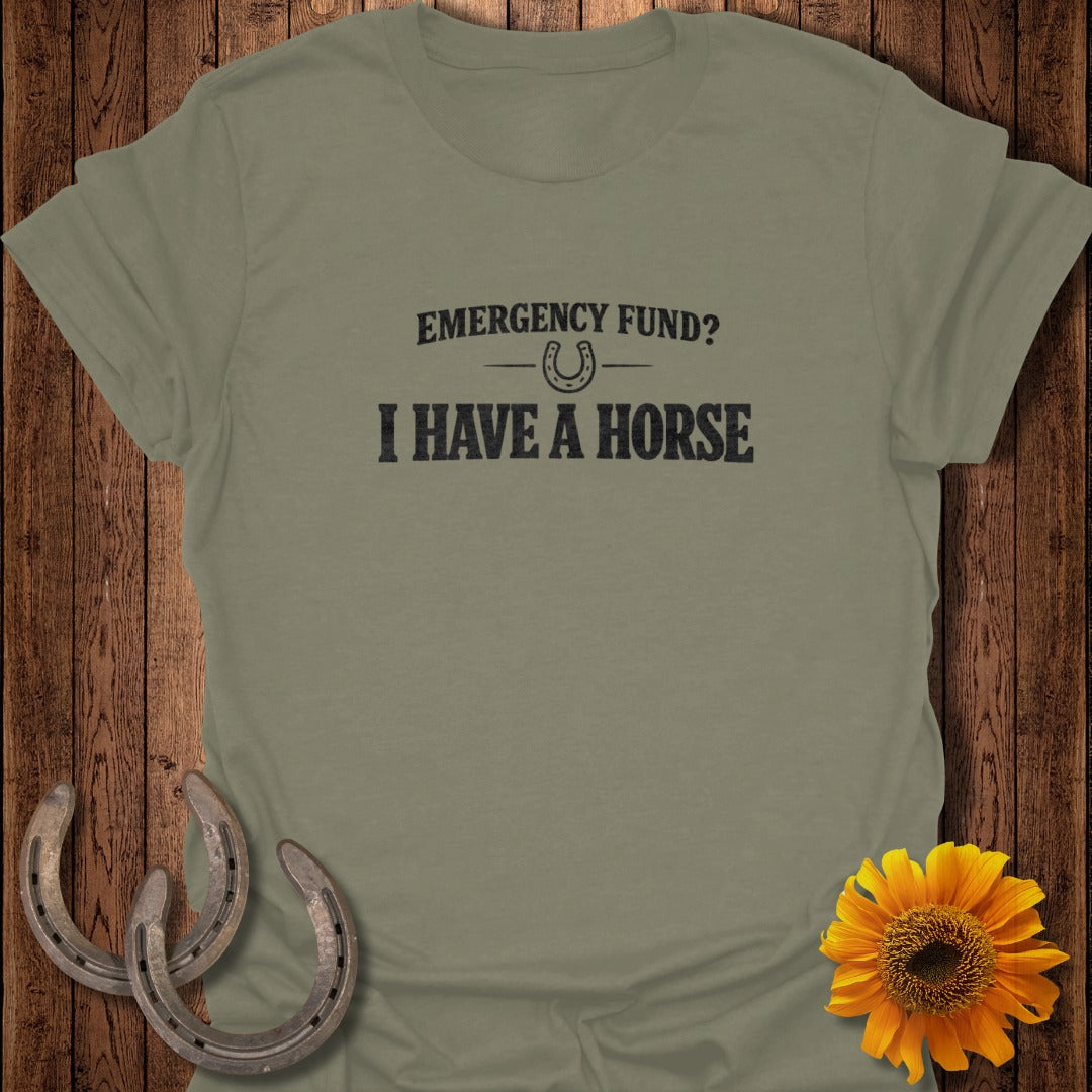 Olive t-shirt with "EMERGENCY FUND? I HAVE A HORSE" text and horseshoe graphic.