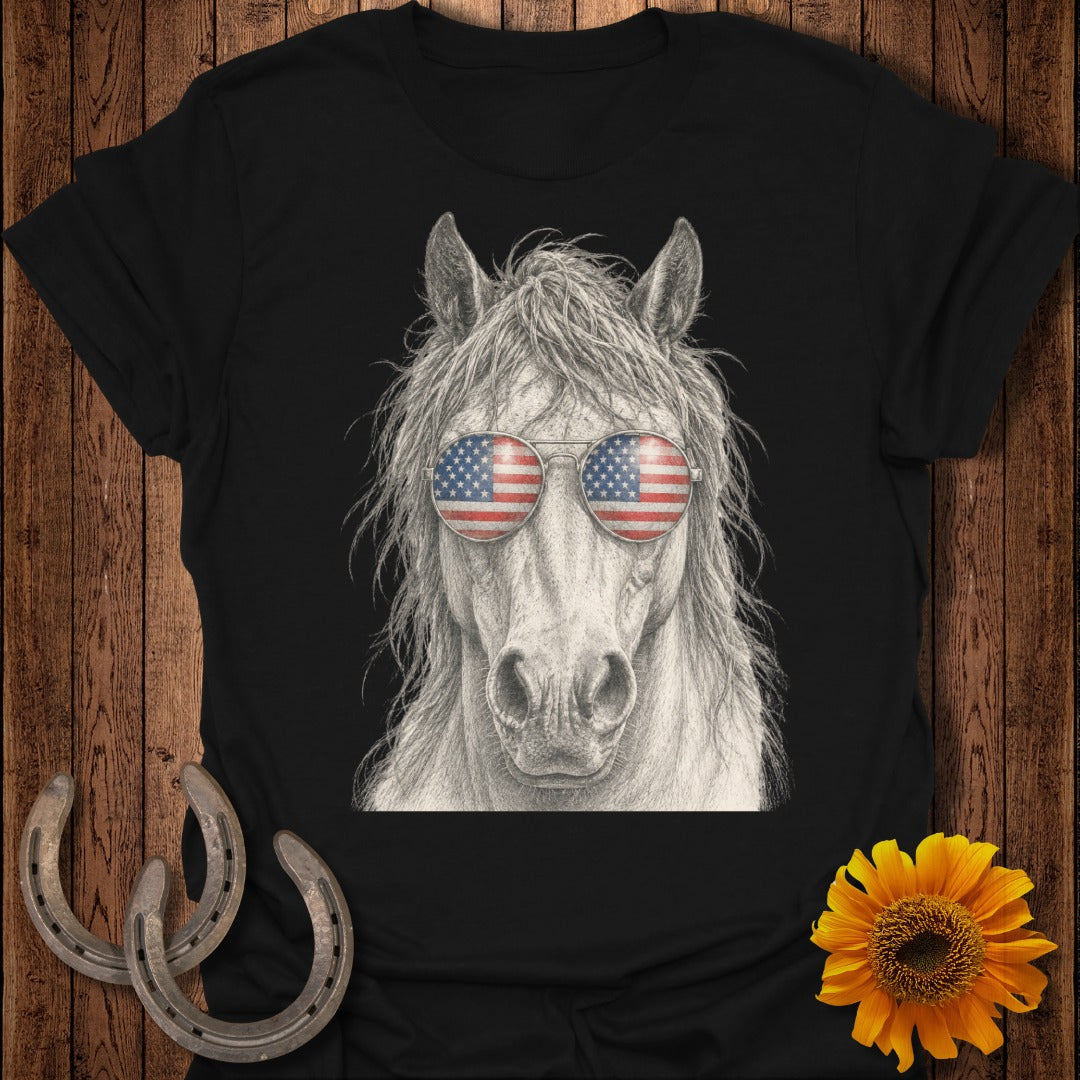 Horse wearing American flag sunglasses on a black t-shirt.