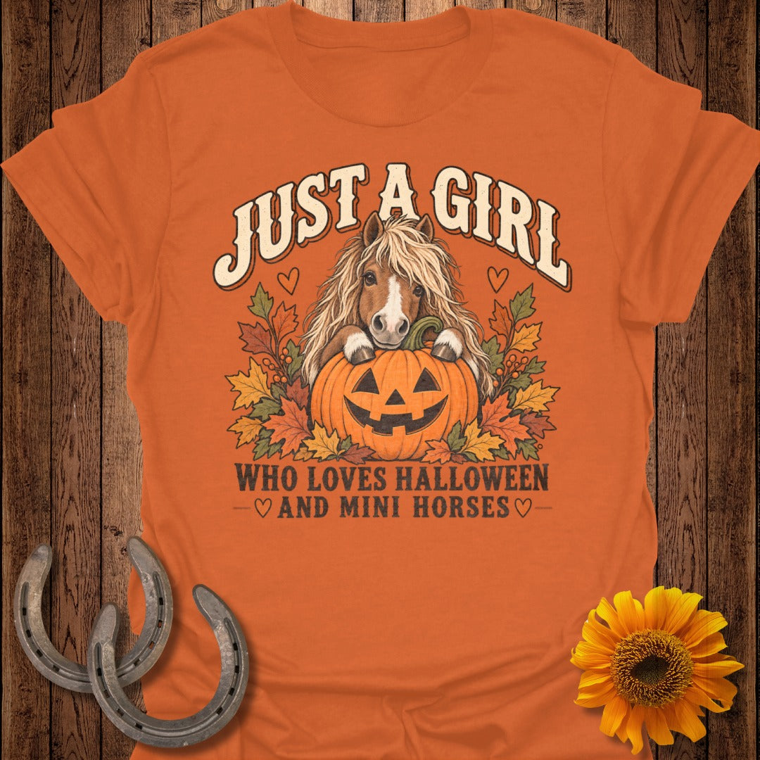 Orange t-shirt with "Just a girl who loves Halloween and mini horses" text and illustration.