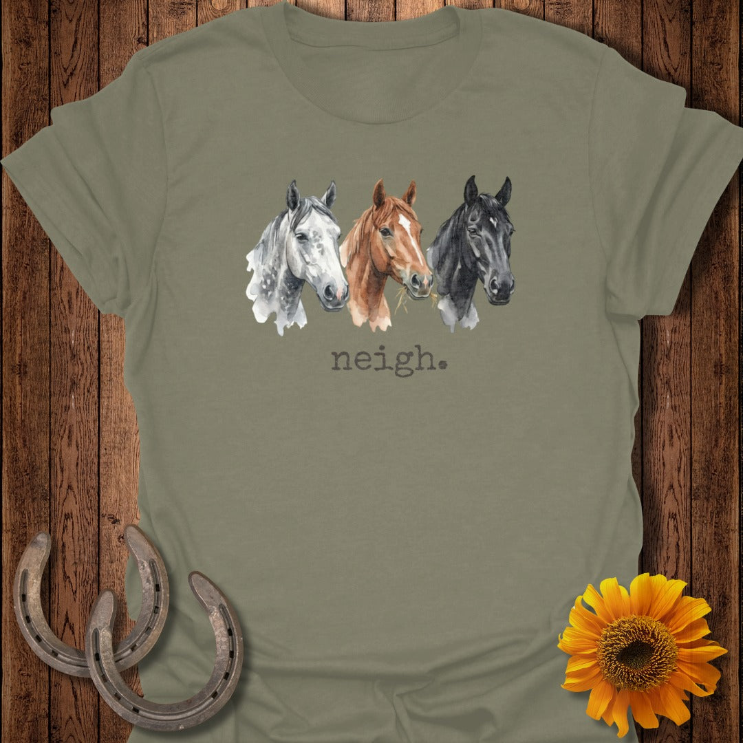 Three watercolor horses with "neigh." text on a taupe t-shirt.