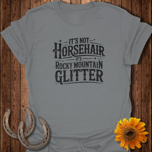 Gray t-shirt with "It's not Horsehair, It's Rocky Mountain Glitter" text.