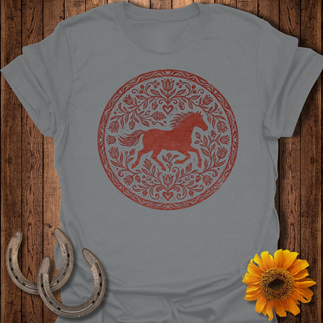Grey t-shirt with a circular red floral and horse design.