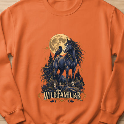 Black horse with crow under moon and trees, text "WILD FAMILIAR"