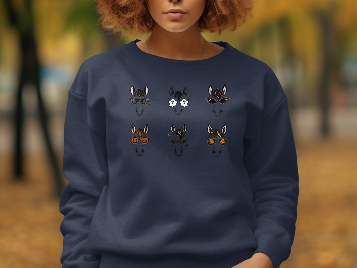 Dark blue sweatshirt with six Halloween-themed horse heads graphic print.