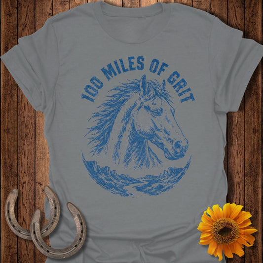 Grey t-shirt with blue horse head graphic and "100 Miles of Grit" text.