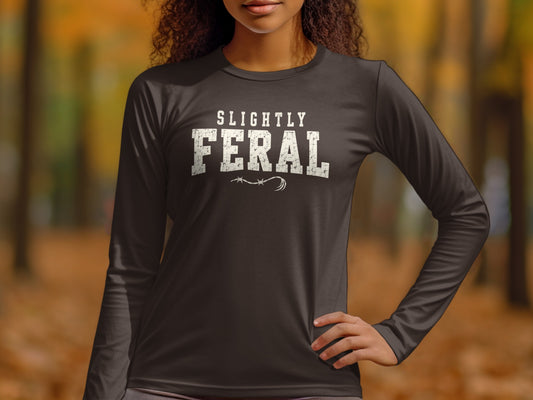 Dark long-sleeved shirt with "SLIGHTLY FERAL" graphic and barbed wire.