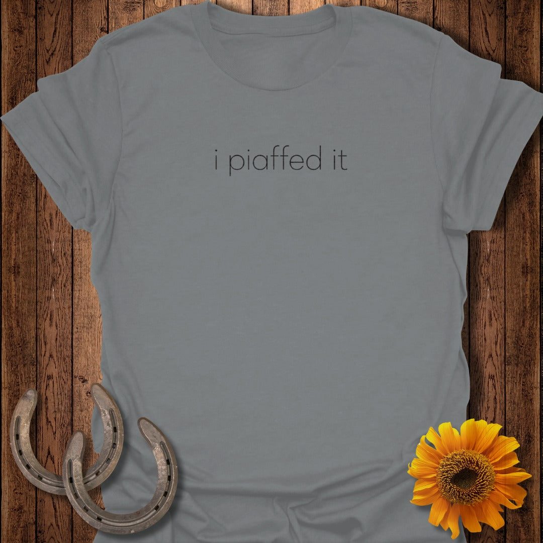 Grey t-shirt with text "i piaffed it", horseshoes, and sunflower.