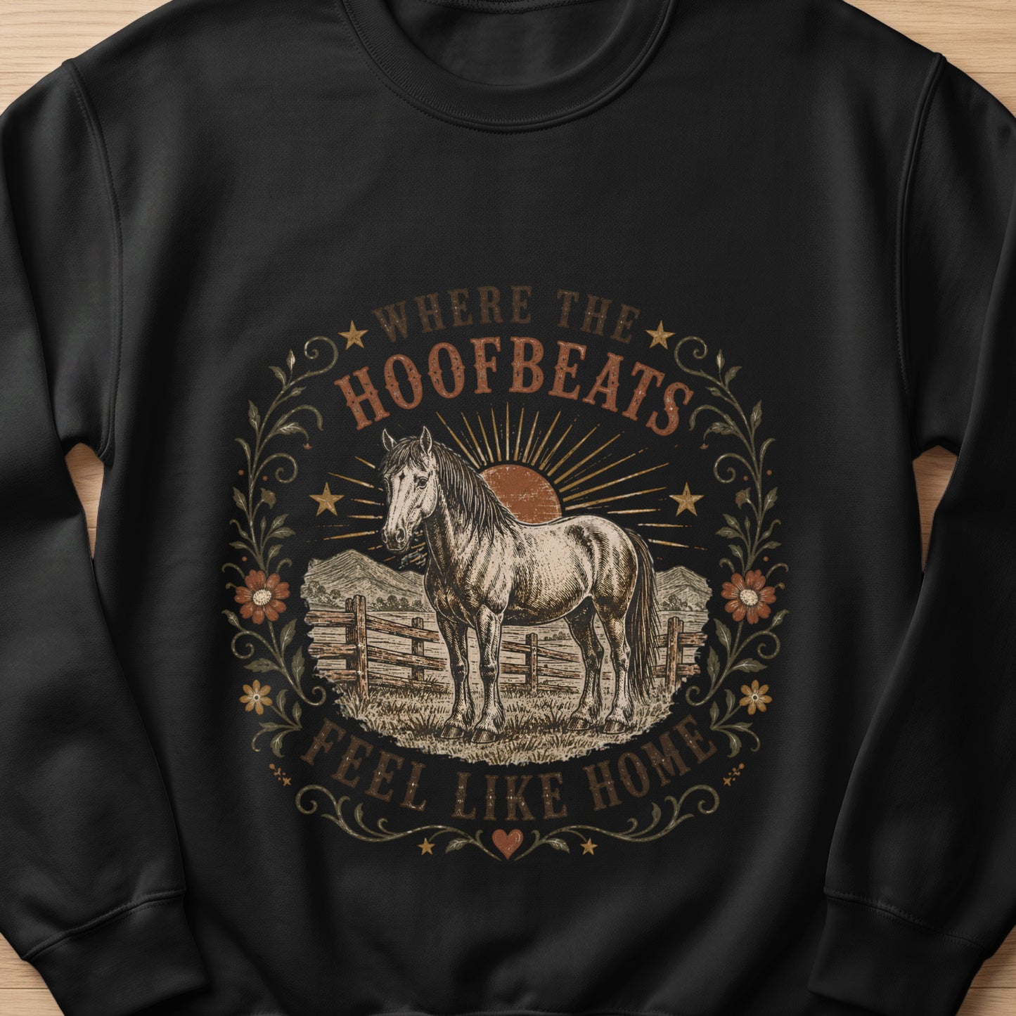 Horse standing in a field with mountains, text reads "Where the hoofbeats feel like home."