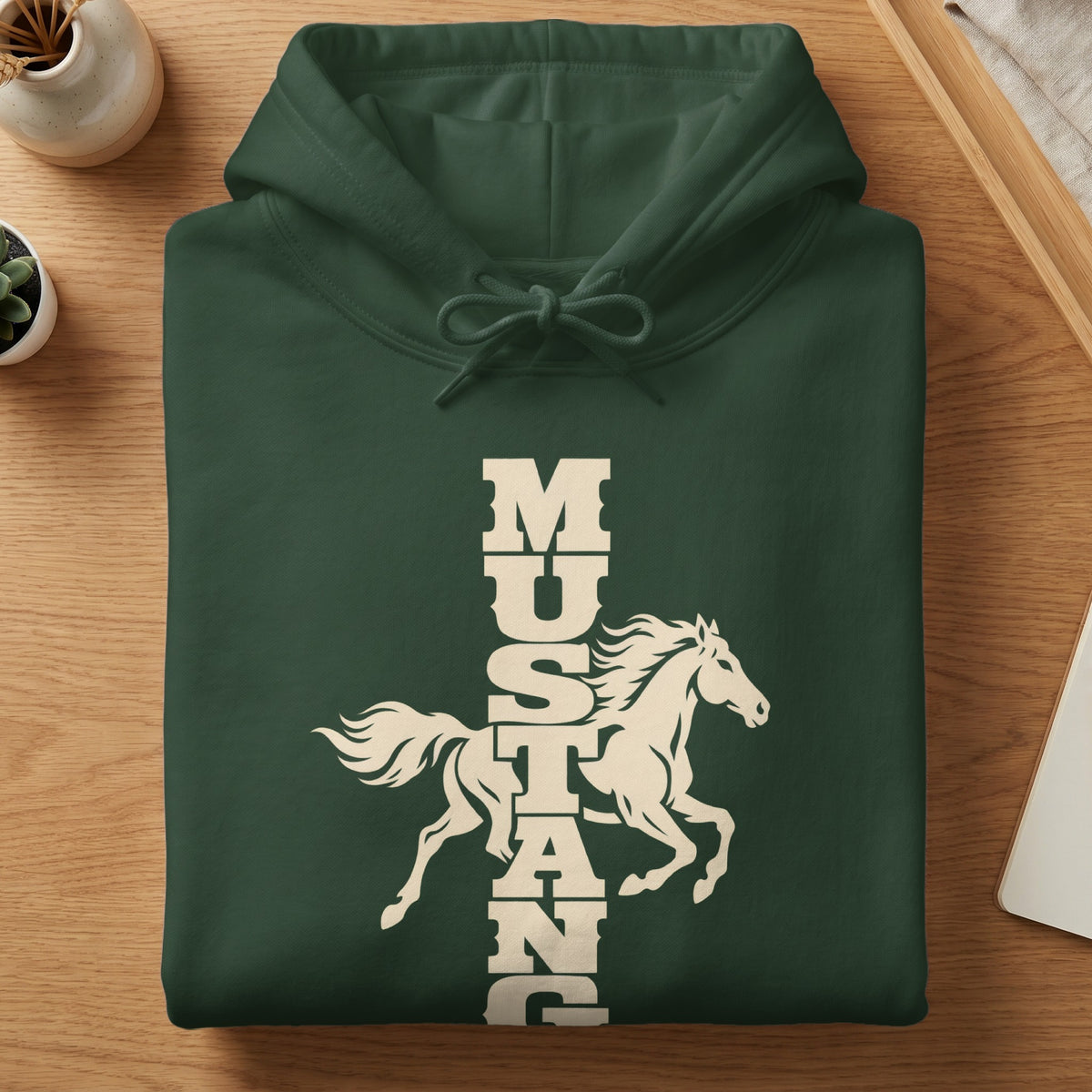 Folded dark green hooded sweatshirt with white graphic of a running horse and vertical Mustang text.