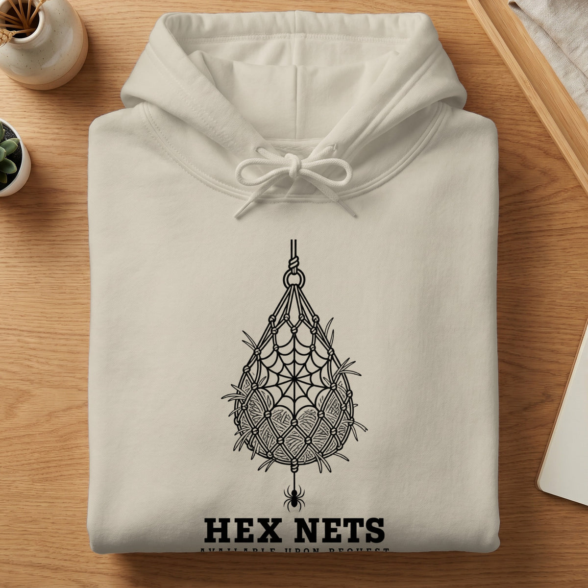 Cream hoodie with black "Hex Nets" text and a spiderweb design.