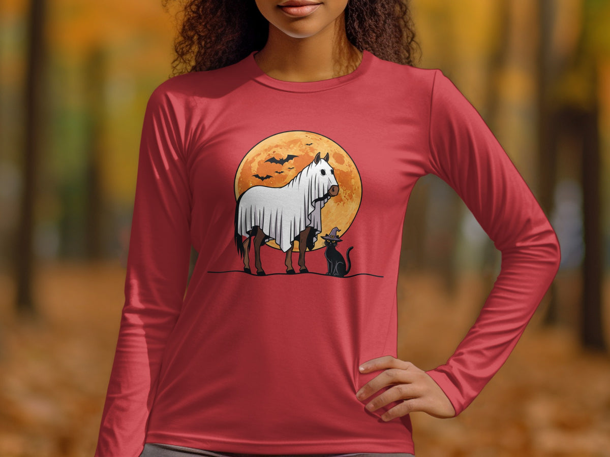 Horse in a ghost costume and black cat with witch hat against full moon and bats.