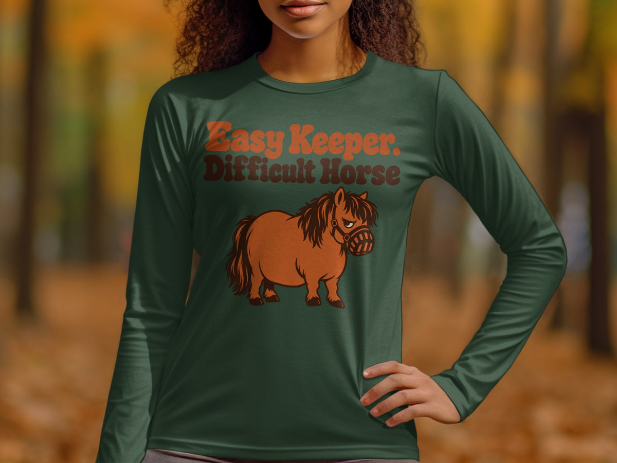 Long sleeve dark green shirt with "Easy Keeper. Difficult Horse" and a cartoon horse.