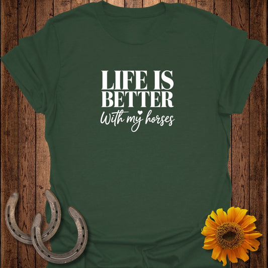 Green t-shirt with white text "LIFE IS BETTER With my horses" and horseshoes.