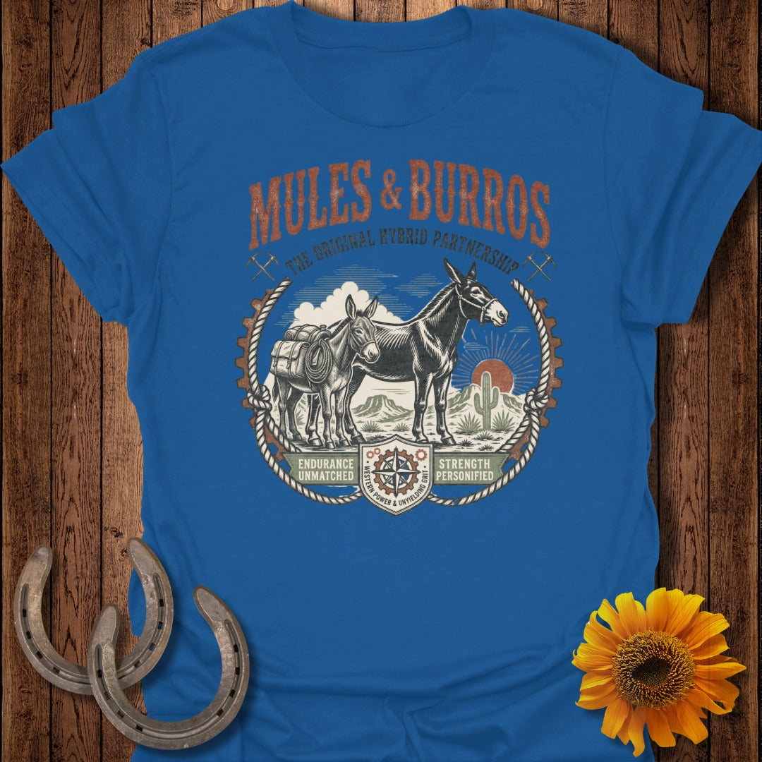 Royal blue t-shirt with "Mules & Burros" graphic of two donkeys, mountains, and sun.