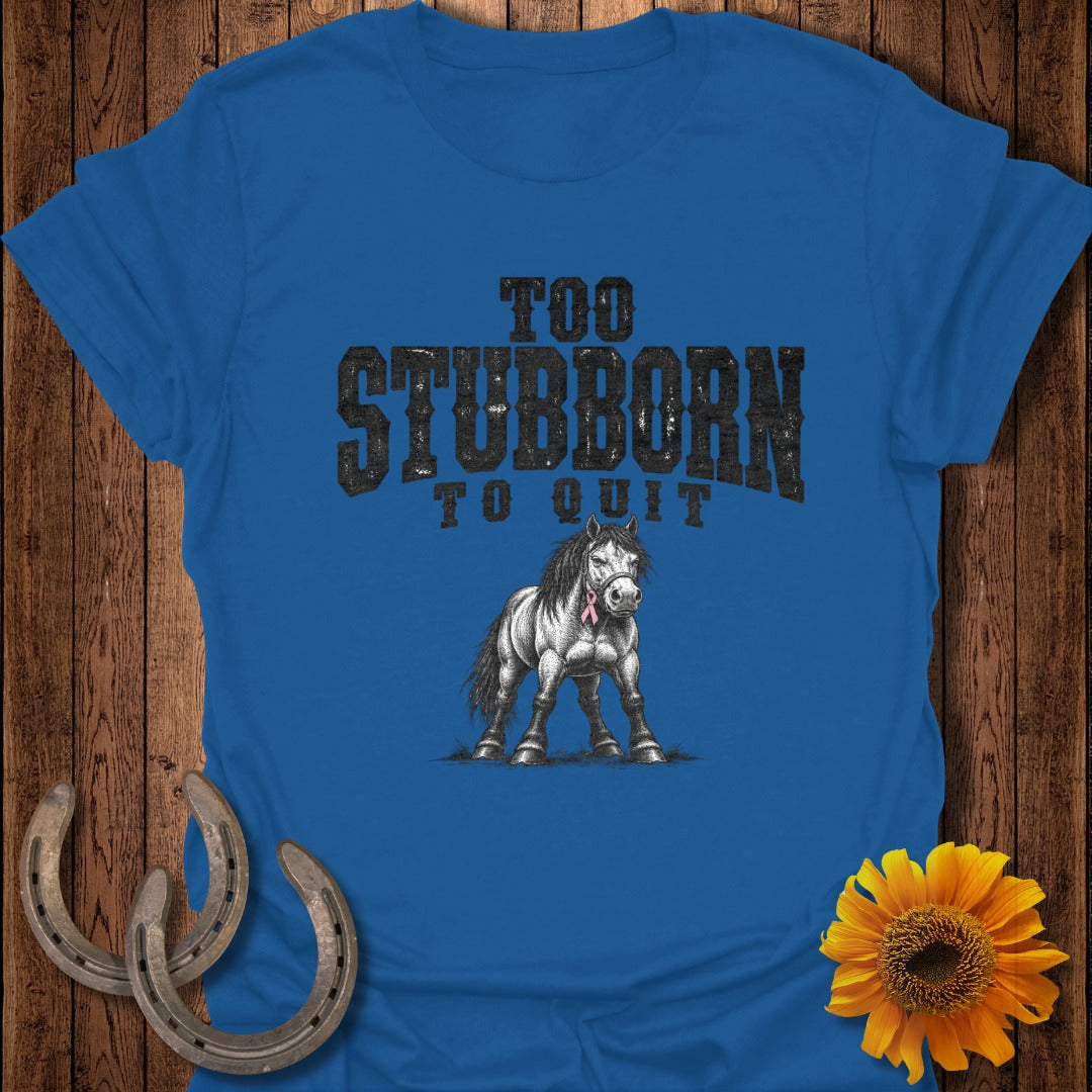 Blue t-shirt with a sketch of a horse and the text "TOO STUBBORN TO QUIT".