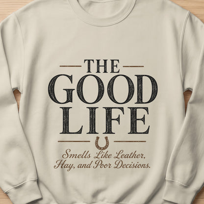 Cream sweatshirt with "The Good Life" text and horseshoe graphic.