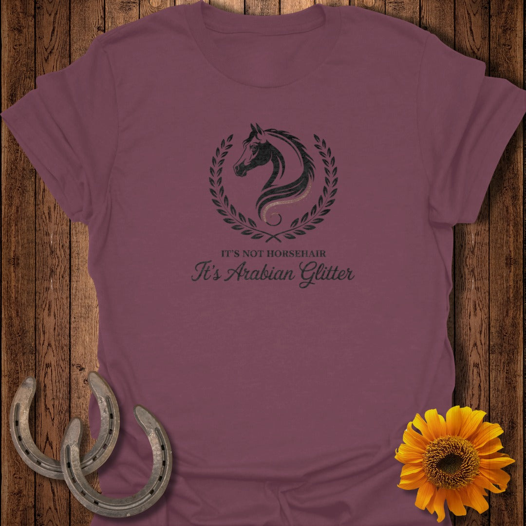 Burgundy t-shirt with a horse silhouette and "It's Not Horsehair, It's Arabian Glitter" text.