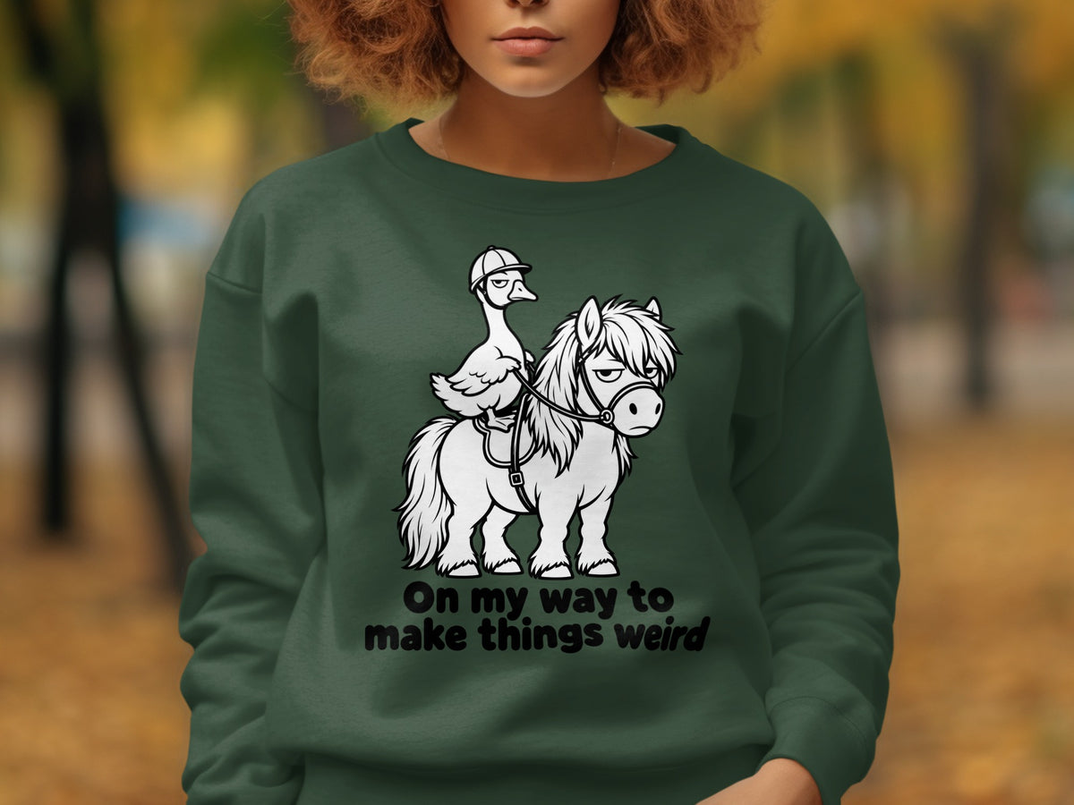 Graphic of a duck riding a horse with text "On my way to make things weird".