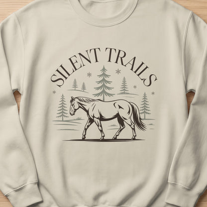 Crewneck sweatshirt with a horse walking in a forest scene and "Silent Trails" text.