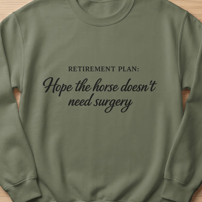 Olive sweatshirt with text: "Retirement Plan: Hope the horse doesn't need surgery."