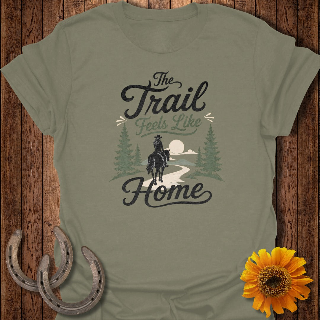 Olive t-shirt with "The Trail Feels Like Home" graphic, woman on horseback.