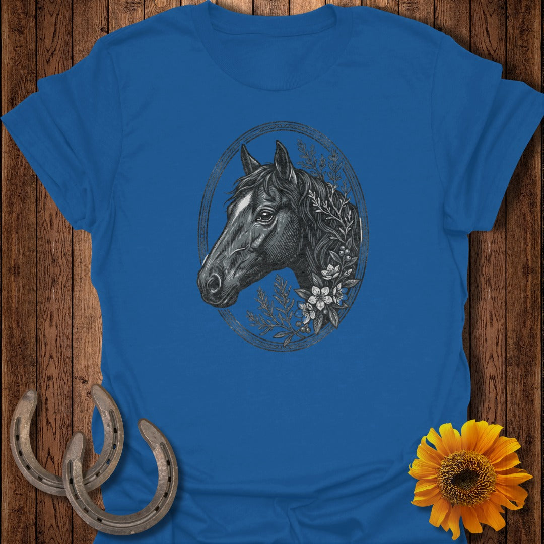 Blue t-shirt with black horse head illustration and floral accents.